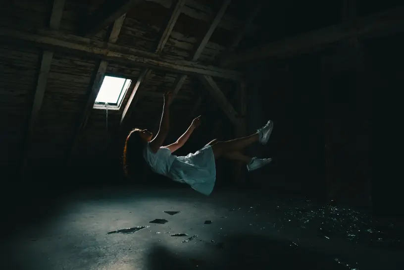 woman-in-white-dress-falling-on-gray-concrete-floor-3856635-1